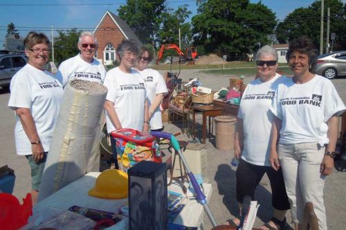 North Frontenac Food Bank volunteers, l-r, Jane Drew, Alex MacLeod, Christine Patterson, Martha MacLeod, Connie Coyle and Kim Cucoch at their first ever community garage sale fundraiser  